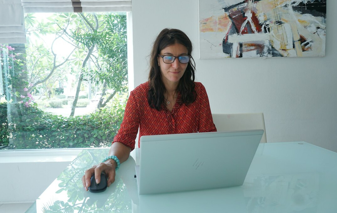 woman working on laptop at home