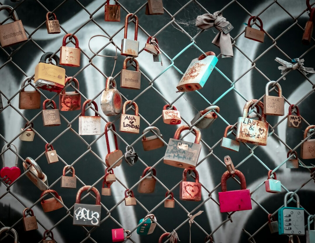 Digital padlock graphic over a circuit-like background