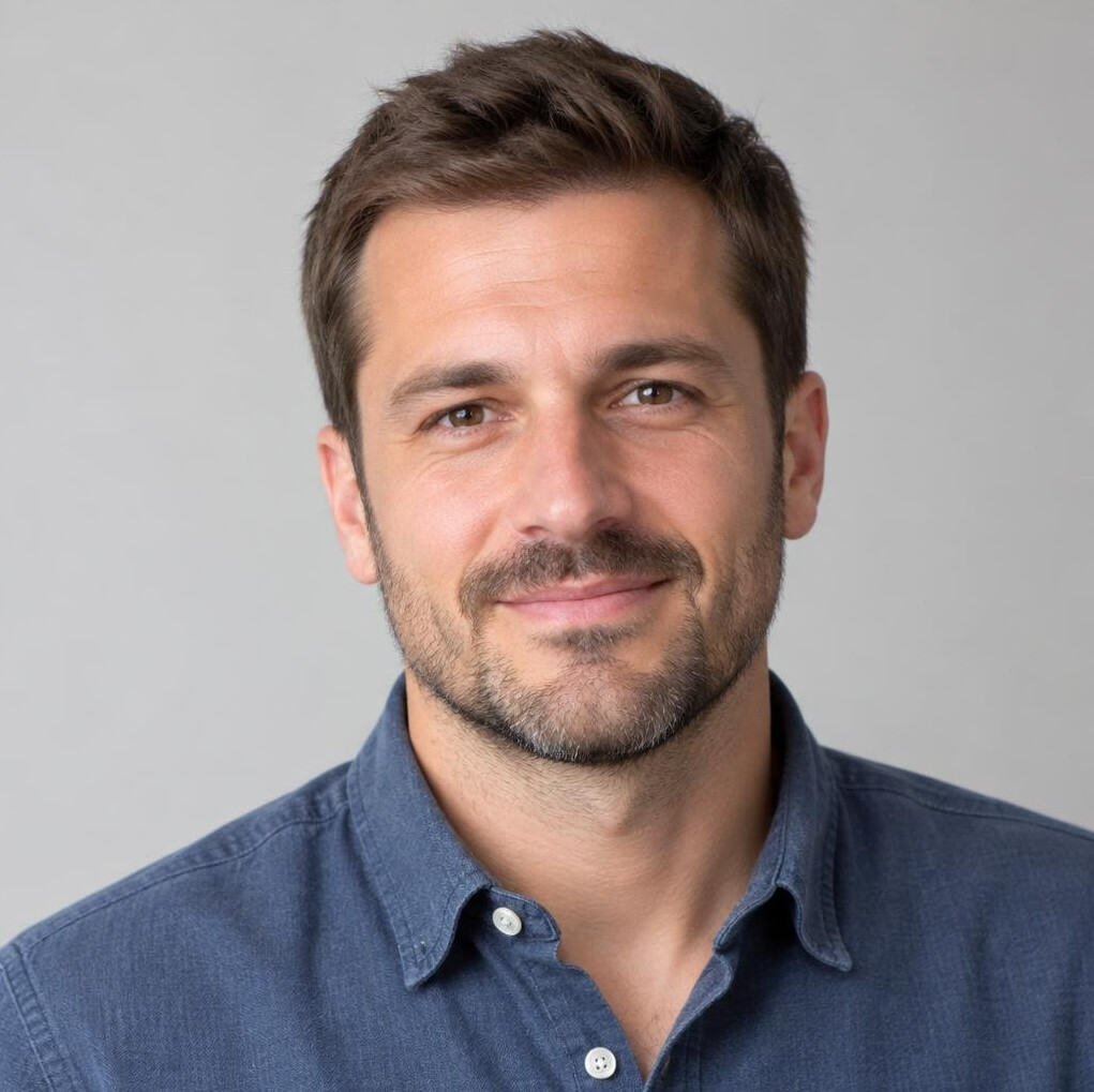 Portrait of a man with short hair and a light beard